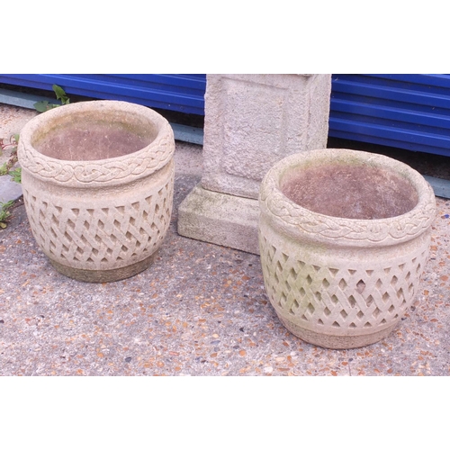 97 - Set of three stoneware garden planters and a square column plant stand, the largest 51cm H