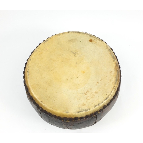 191 - African double sided skin drum with hand painted decoration, 36cm in D