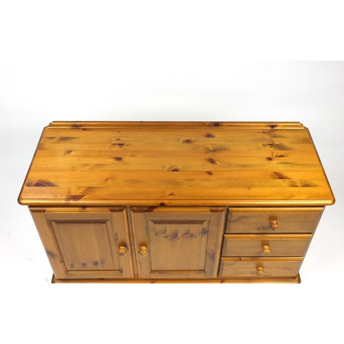 35 - Pine sideboard and coffee table, the sideboard 69cm H x 117cm W x 43cm D