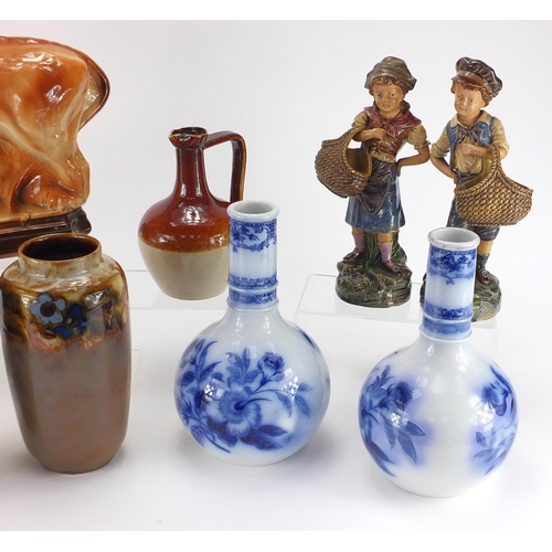 110 - Collectable china and stoneware including a pair of Royal Doulton vases, pair of Majolica style figu... 