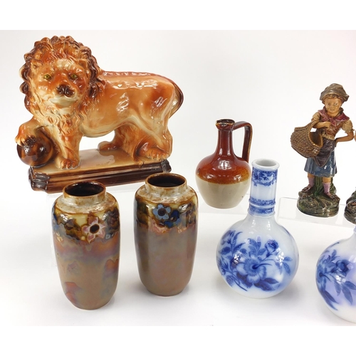 110 - Collectable china and stoneware including a pair of Royal Doulton vases, pair of Majolica style figu... 