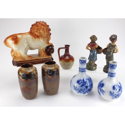 110 - Collectable china and stoneware including a pair of Royal Doulton vases, pair of Majolica style figu... 