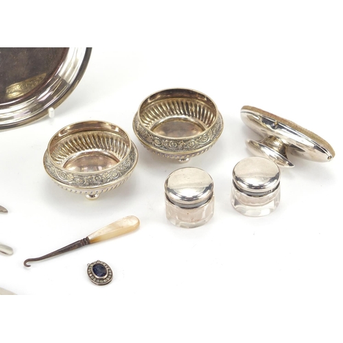 274 - Seven silver mounted vanity items together with a pair of white metal open salts, circular silver co... 