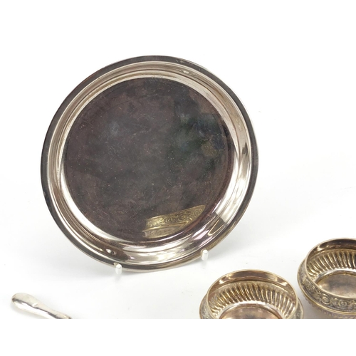 274 - Seven silver mounted vanity items together with a pair of white metal open salts, circular silver co... 