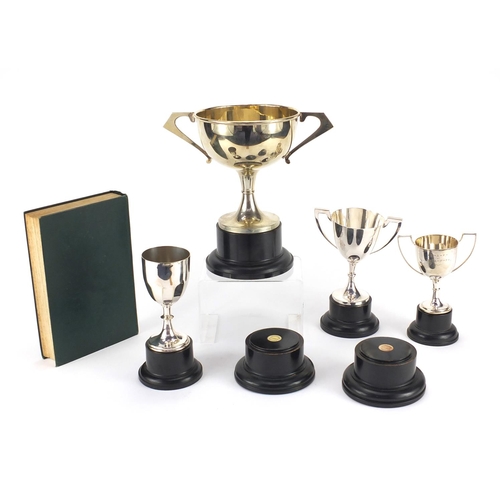 336 - Four silver plated Military interest RAF trophies and a 1937 edition The Voortrekkers of South Afric... 