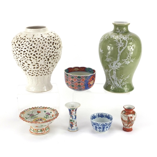 192 - Oriental ceramics including a large baluster shaped vase, blanc de chine lamp base etc, the largest ... 