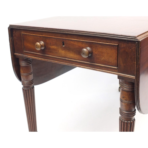 37 - Victorian mahogany Pembroke table fitted with a drawer to either end, raised on turned reeded legs a... 