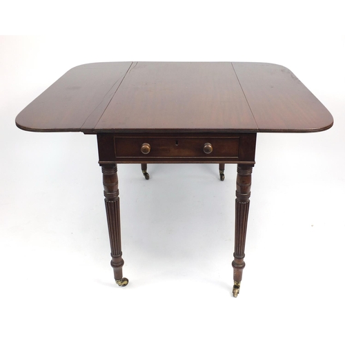 37 - Victorian mahogany Pembroke table fitted with a drawer to either end, raised on turned reeded legs a... 