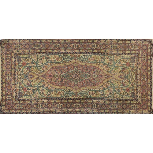41 - Rectangular Persian rug with geometric boarder and floral motifs, 155cm x 80cm