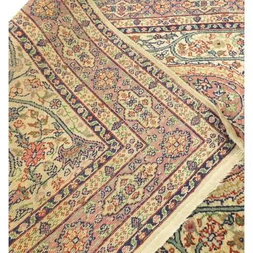 41 - Rectangular Persian rug with geometric boarder and floral motifs, 155cm x 80cm