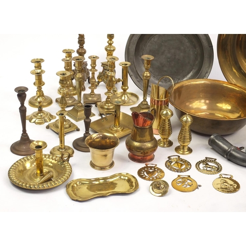 229 - Large selection of antique and later brass candle sticks, pewter plates and tankards etc