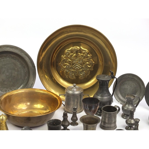 229 - Large selection of antique and later brass candle sticks, pewter plates and tankards etc