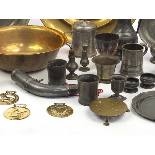 229 - Large selection of antique and later brass candle sticks, pewter plates and tankards etc