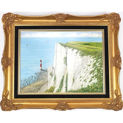 381 - Oil on board beachy head lighthouse, bearing a signature J. George, gilt framed, 40cm x 30cm