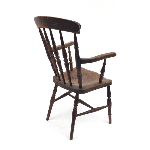 49A - Walnut spindle back elbow chair, 102cm H