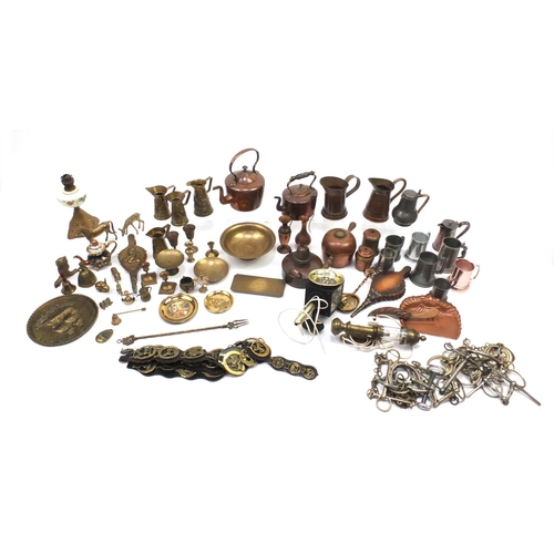 224 - Assorted metal wares including horse brasses, brass flagons, fire bellows, hand painted opaline glas... 