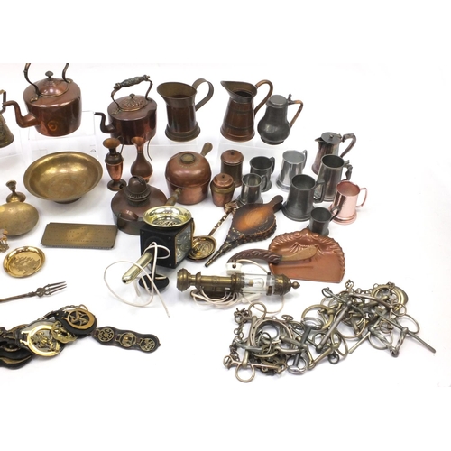 224 - Assorted metal wares including horse brasses, brass flagons, fire bellows, hand painted opaline glas... 