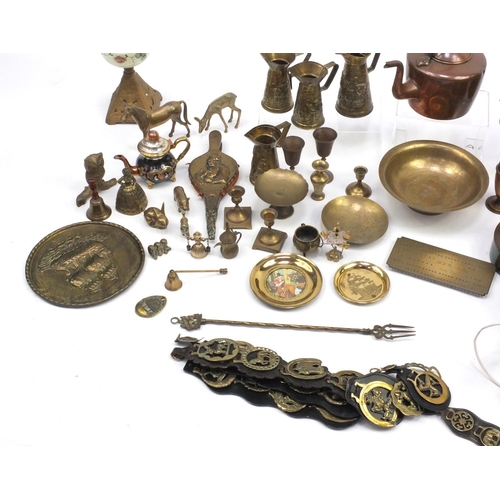 224 - Assorted metal wares including horse brasses, brass flagons, fire bellows, hand painted opaline glas... 