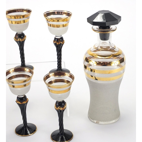 277 - Stylish Art Deco design decanter and six drinking glasses, the decanter 25cm H