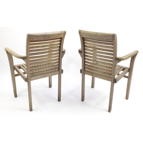 96 - Pair of teak garden chairs, 95cm H