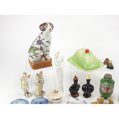 403 - Collectable china including Wade Whimsies, Gouda miniature jugs, Oriental dogs etc