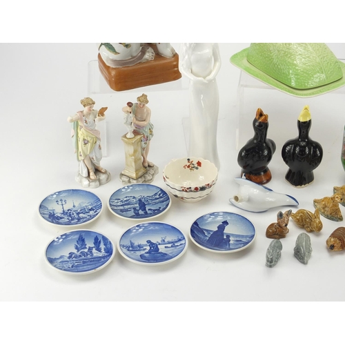 403 - Collectable china including Wade Whimsies, Gouda miniature jugs, Oriental dogs etc