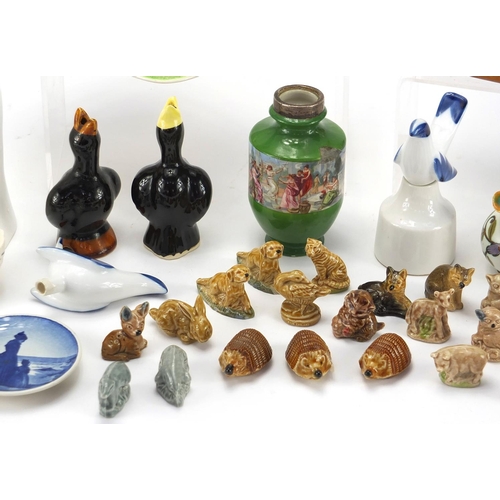 403 - Collectable china including Wade Whimsies, Gouda miniature jugs, Oriental dogs etc