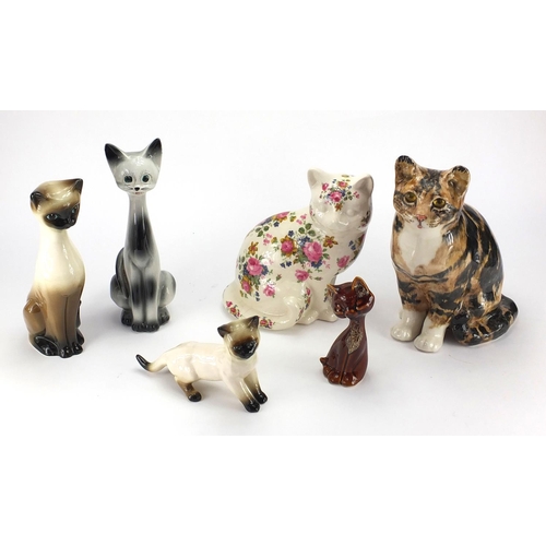 402 - Group of china cats including a large signed Winstanley example