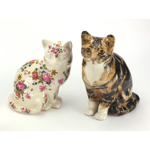 402 - Group of china cats including a large signed Winstanley example