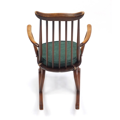 32 - Ercol stick back rocking chair, 85cm H