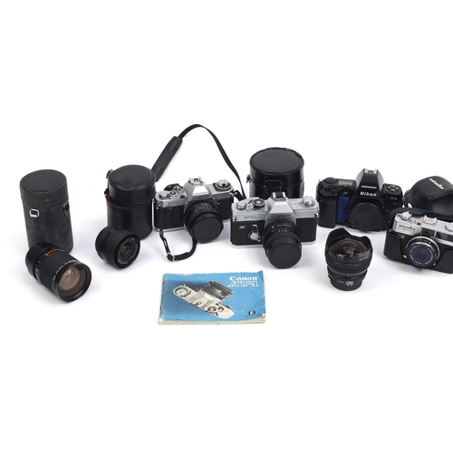 212 - Cameras and lenses including a Canon AD-1 and Canon FTB