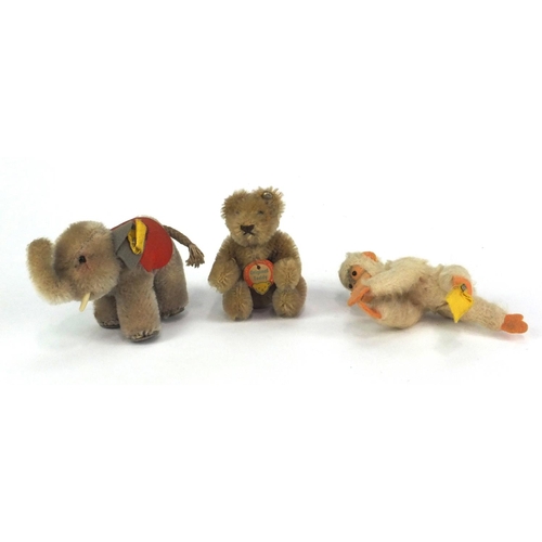 337 - Three Steiff teddies comprising a bear with articulated limbs and original paper label, an elephant ... 