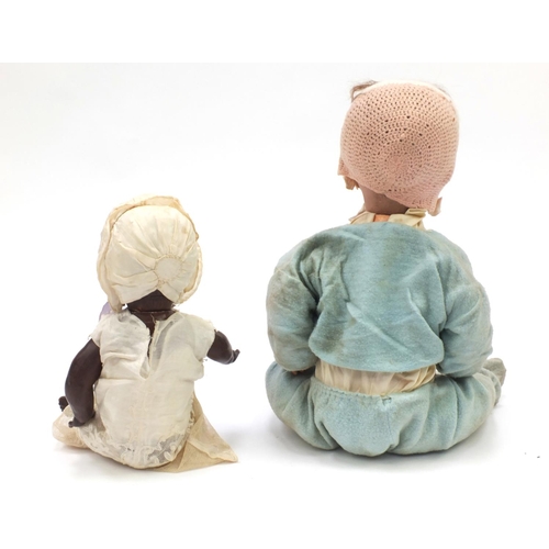 131 - Two Armand Marseille bisque headed dolls, each with open close eyes and composite limbs, including a... 