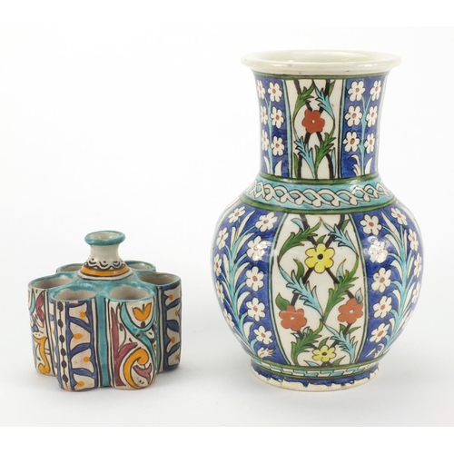 395 - Iznik pottery vase and sectional vessel both hand painted with stylised flowers, the vase 21cm high