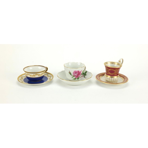 396 - Three continental cups and saucers comprising Meissen KPM and a Hutschenreuther  examples, the Meiss... 