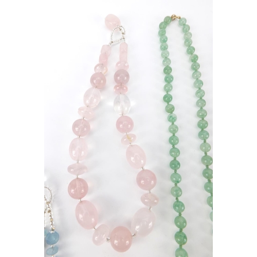 259 - Semi precious stone necklaces including quartz and a coral example