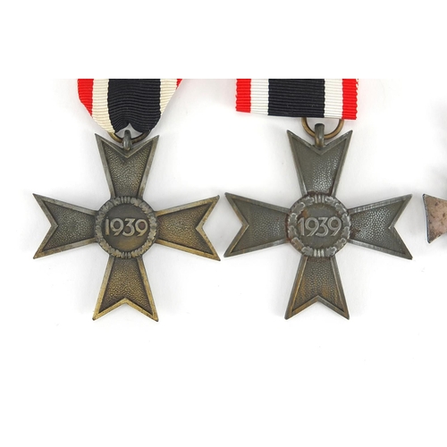 199 - German Military interest medals and badges comprising mothers cross, Merit Cross, Wounds badge and C... 