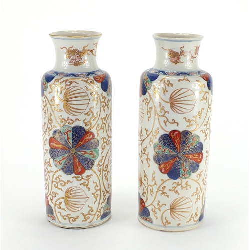 234 - Pair of Chinese porcelain cylindrical vases, possibly Kangxi period, both hand painted in the Imari ... 
