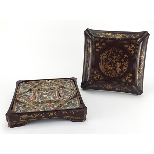 254A - Chinese porcelain sectional dishes, housed in a square lacquered container with lift off lid, gilded... 