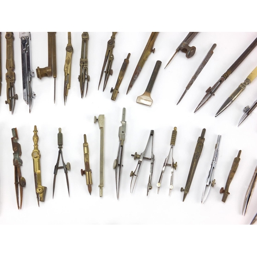 66 - Collection of antique and later mostly brass drawing instruments including, various makers