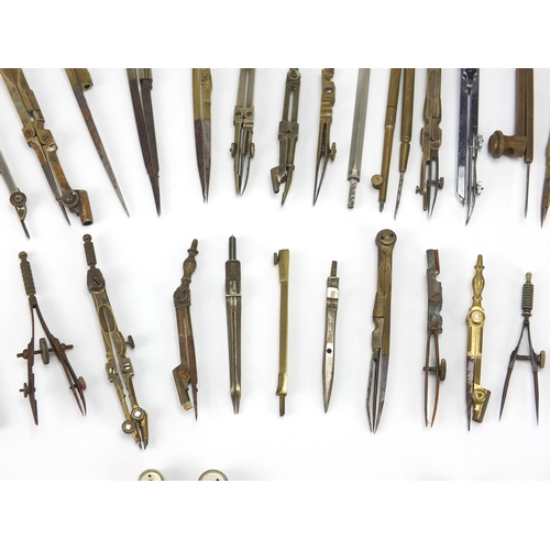 66 - Collection of antique and later mostly brass drawing instruments including, various makers