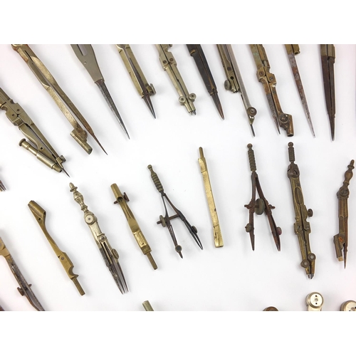 66 - Collection of antique and later mostly brass drawing instruments including, various makers