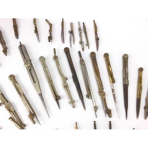 66 - Collection of antique and later mostly brass drawing instruments including, various makers