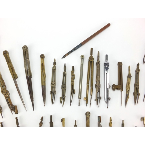 66 - Collection of antique and later mostly brass drawing instruments including, various makers