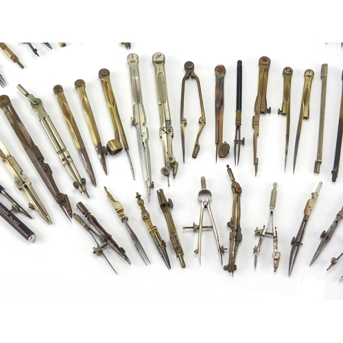 66 - Collection of antique and later mostly brass drawing instruments including, various makers