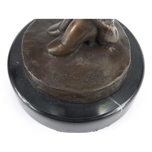 2098 - Bronze study of an Art Deco female holding her dress, raised on a circular marbleised base, signed E... 