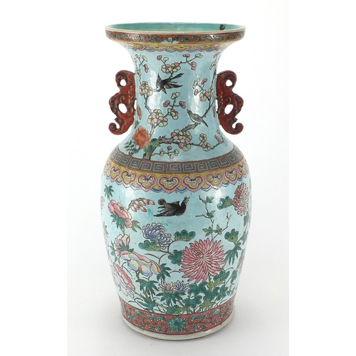 250 - Chinese porcelain vase with iron red twin handles, hand painted in the famille rose palette with bir... 