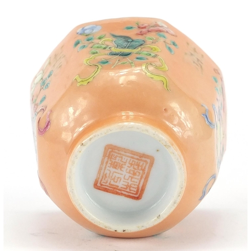 258 - Chinese octagonal porcelain tea bowl, hand painted in the famille rose palette with four emblems ont... 