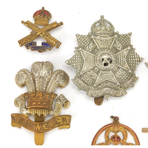 187 - Military interest cap badges, cloth insignia and a German medal including Sheffield University, Midd... 