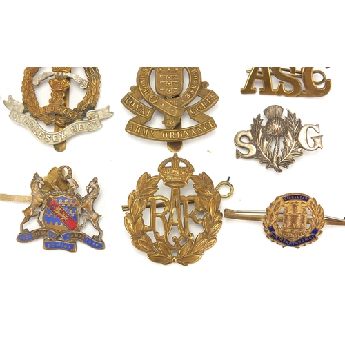 187 - Military interest cap badges, cloth insignia and a German medal including Sheffield University, Midd... 